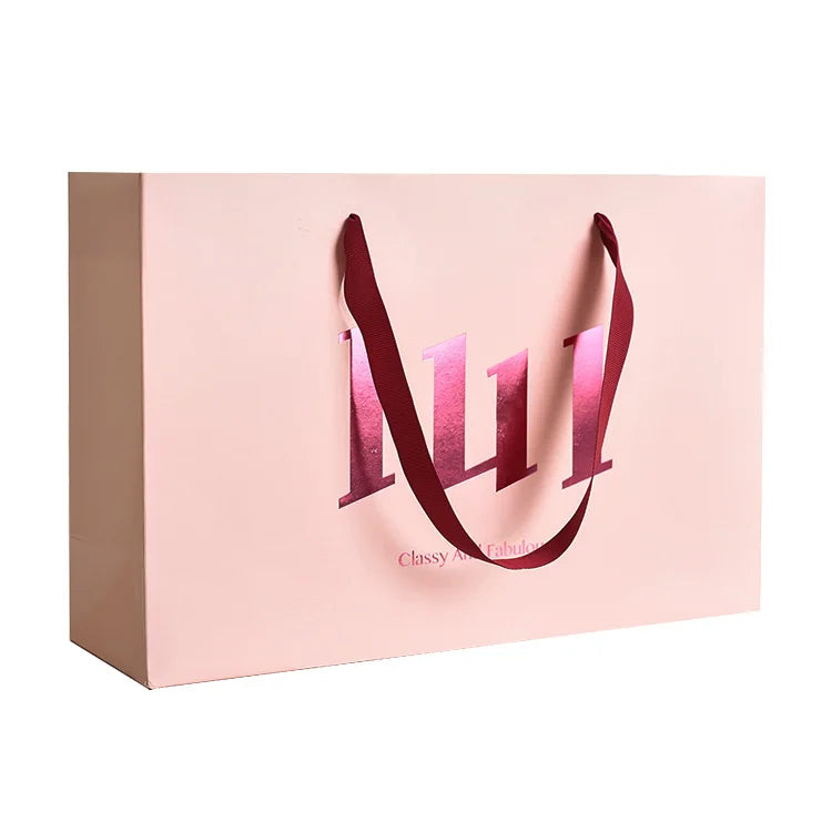 Wholesale Luxurious Paper Gift Tote Shopping Bag Custom Pink with Printed Logo for Clothing and Shoes