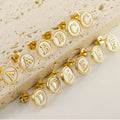 ES1151 Tiny 18K Gold Plated Stainless Steel Round White Shell Pearl Alphabet Initial Letter Studs Post Earring for Women Girls