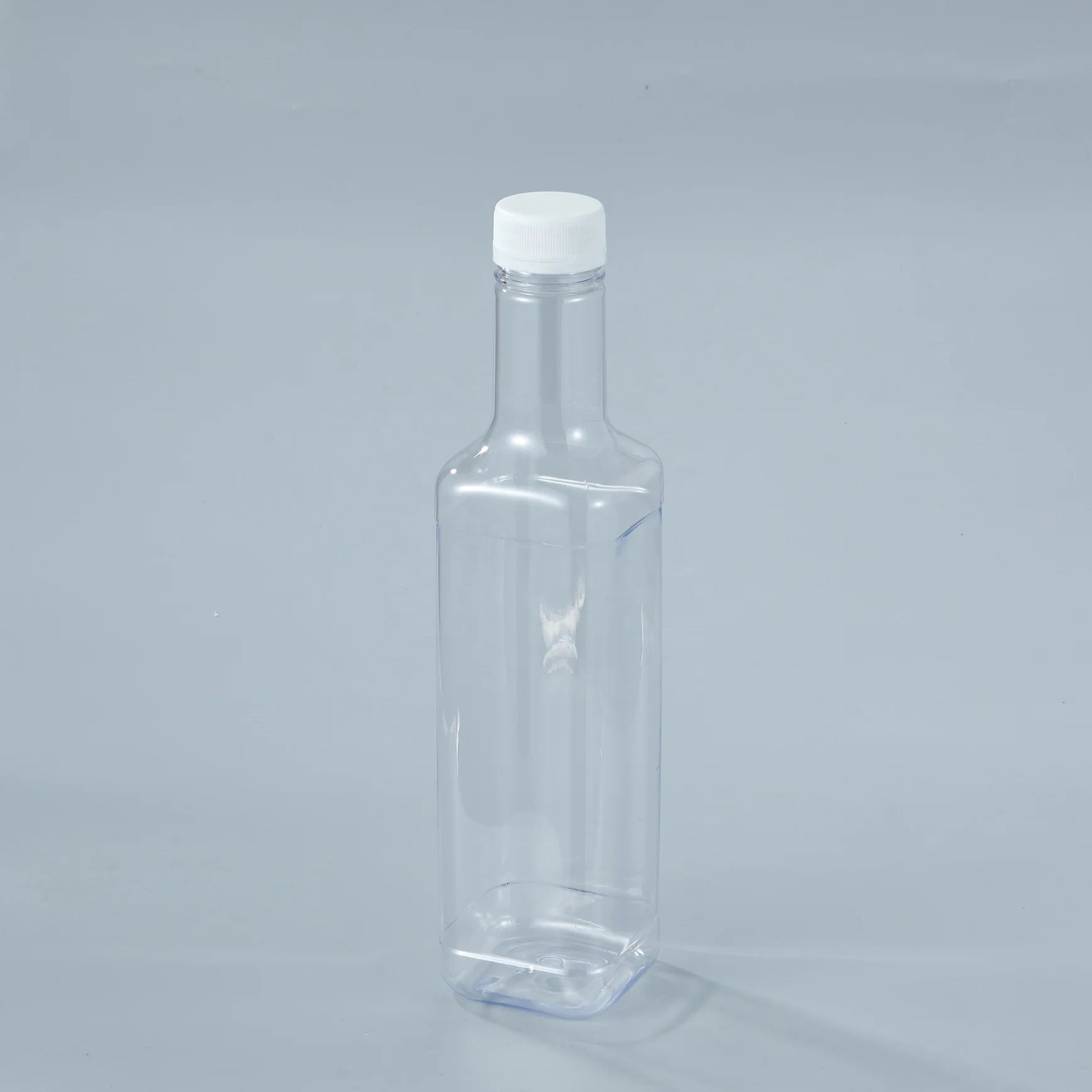 1LPET Food-Grade Transparent 1000ml Beverage Bottle with Screen Printing for Soda Whisky Juice Mineral Water & Champagne