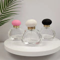 Hot Selling  50ml Round Perfume Glass Bottle  Clear Crimp Pump Parfum Glass Bottles Plastic Cap