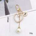 New Fashion Woven Camellia Keychain with Pearl and Stainless Steel 3D Shape Cute Design for Women Bags and Cars
