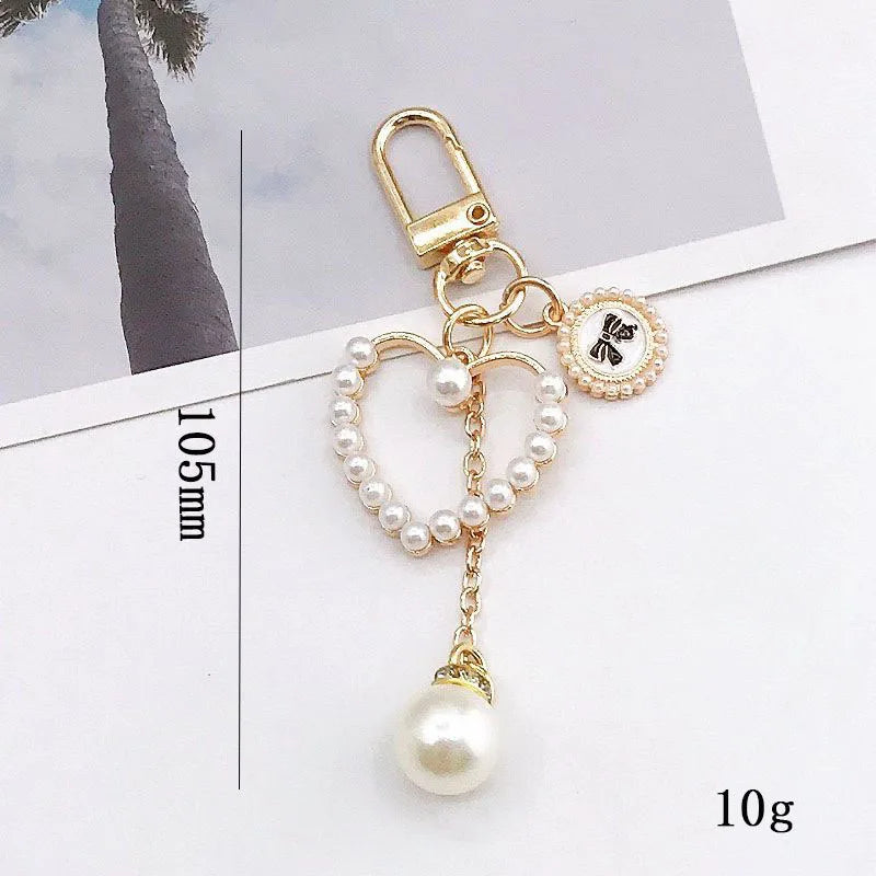 New Fashion Woven Camellia Keychain with Pearl and Stainless Steel 3D Shape Cute Design for Women Bags and Cars