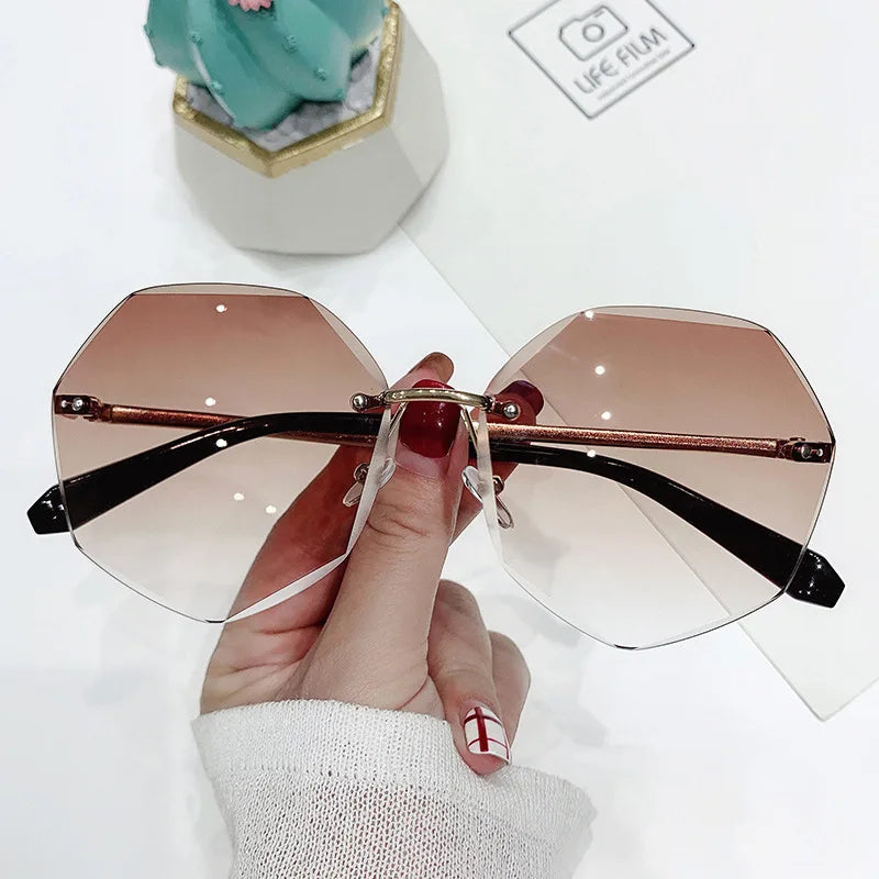 New Polygonal Ladies Sunglasses with UV400 Lenses European and American Style Metal Rimless Sunglasses Wholesale