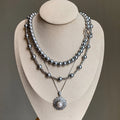 2025 New Gray Pearl Beaded Snowflake Pendant Necklace Layered Sweater Chain Women's Jewelry Factory Wholesale