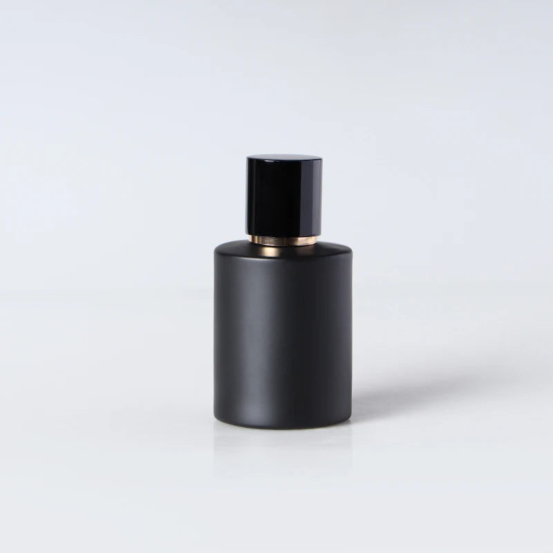 50ml 100ml Empty Cylinder Luxury Custom Luxury Matte Black Perfume Glass Bottle with Sprayer and Lid