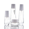 Factory Directly Sell Luxury Airless Glass Jar Dispenser White Face Cream Jar Empty Cosmetic Lotion Bottle Serum Jar Bottle Set