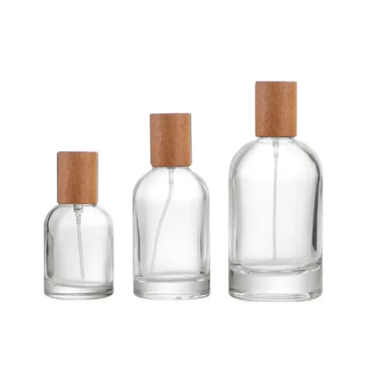 MUB Wholesale 30ml 50ml 100ml Custom Design Crimp Round Empty Glass Perfume Bottle with Pump Spray Cap
