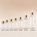 Wholesale Skincare Cosmetic Packaging 5ml 15ml 30ml 50ml 100ml Transparent Gold-ring Essential Oil Glass Dropper Bottle