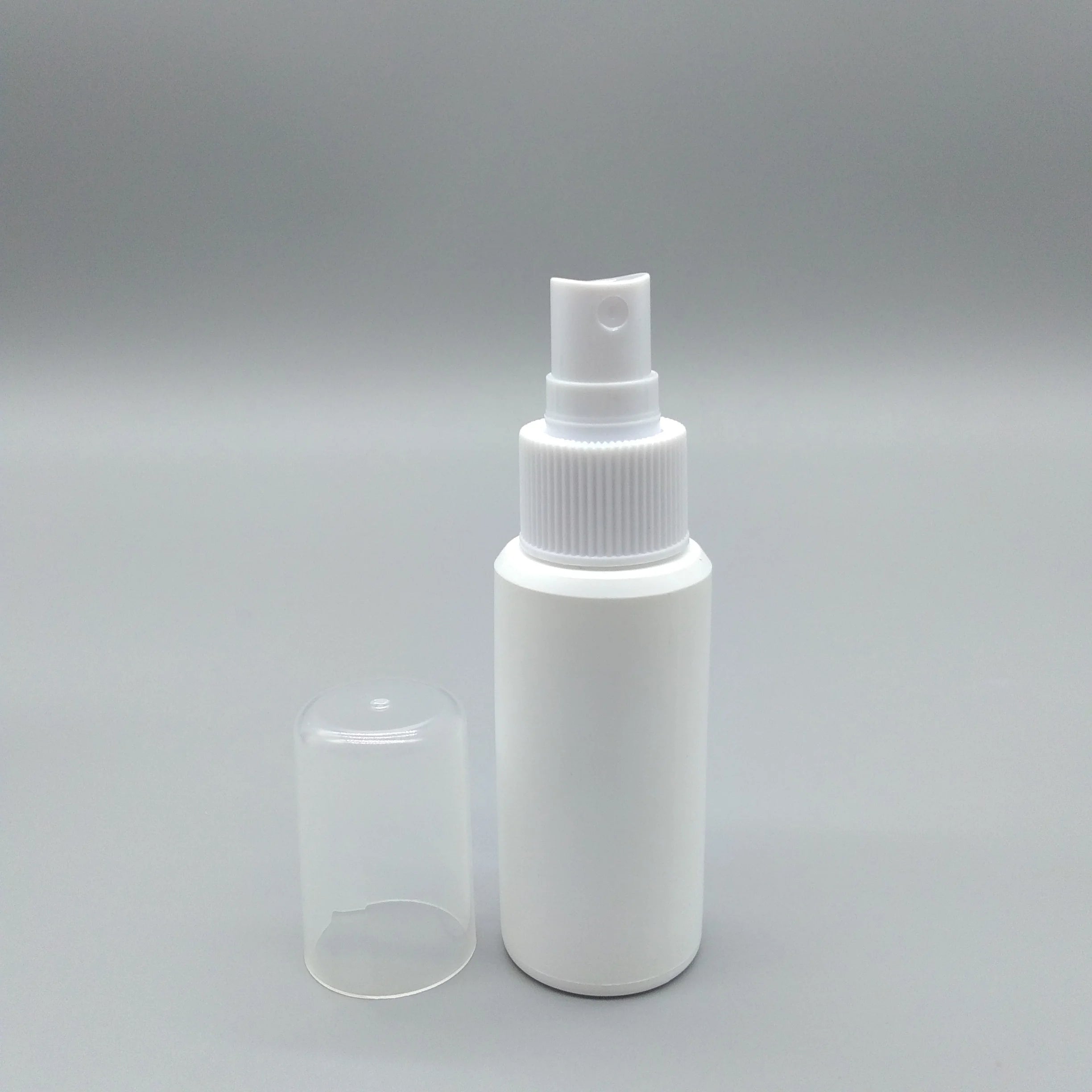 Flat Shoulder PET 60ml 2oz White Black Plastic Spray Bottle Beauty Mist Spray Pump Personal Care Packaging 24/410