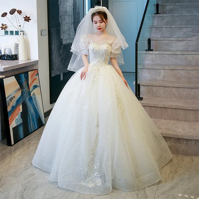 2022 New Arrival Illusion O Neck Short Sleeves Bling Bling Wedding Dresses Appliqued Crystal Lace Bridal Gowns