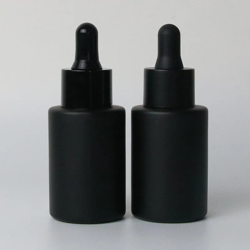 Luxury 30ml 1oz Custom Matte Black Essential Oil Bottles Empty Flat Shoulder Glass Face Serum Dropper Bottle