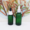 1oz Frosted Green Essential Oil Glass Dropper Bottle for Cosmetic Packaging