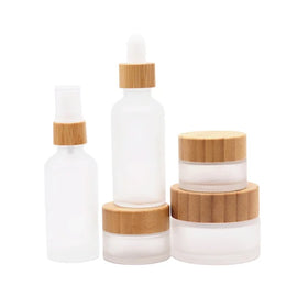 Luxury Frosted Clear Glass Bottles and Jar Pump for Skin Care Cream Make-Up Set with Droppper for Lotion and Serum