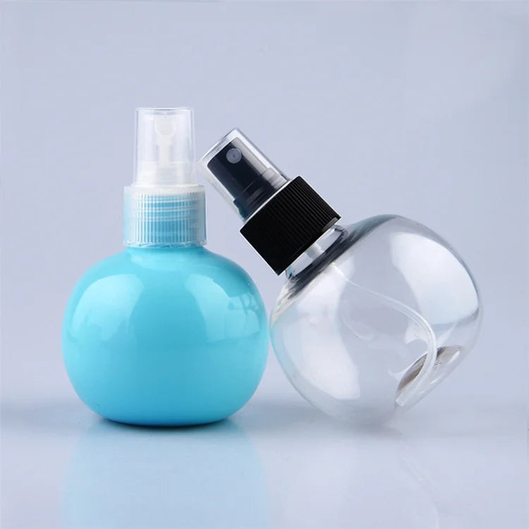 Customized Color 120ml Ball Shaped Cosmetic Colored Spray PET Hair Water Empty Trigger Sprayer Mini Spray Bottle With Keychain