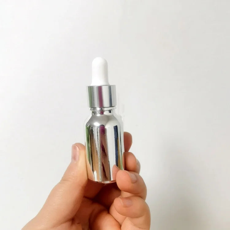 Cheaper Price 15ml 30ml 50ml 100ml Gold Silver Essential Oil Dropper Brown Glass Bottles with Measurement Dropper Pump Spray