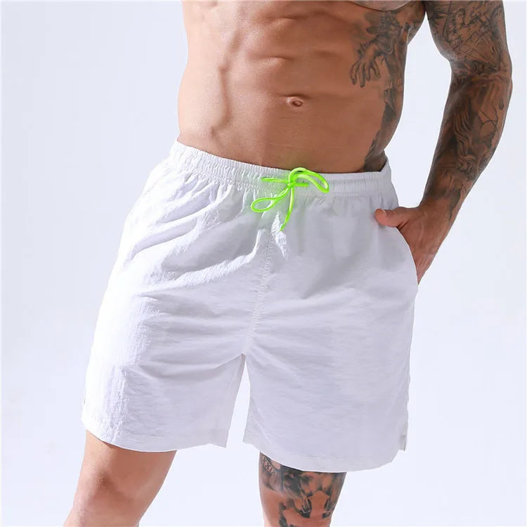 Wholesale Men Casual Sports Pants Solid Color Plus Size Shorts Fashionable Beach Pants Surfing Pants