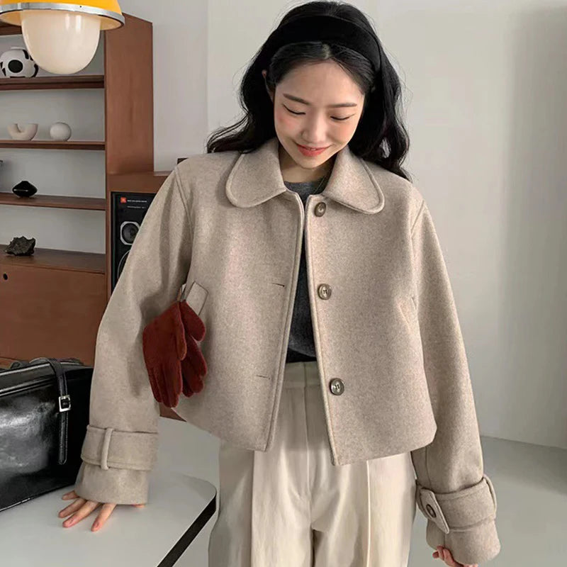 Wholesale 2026 Autumn Vintage Age Reducing Doll Collar Single Breasted Loose Versatile Solid Long Sleeve Woolen Coat