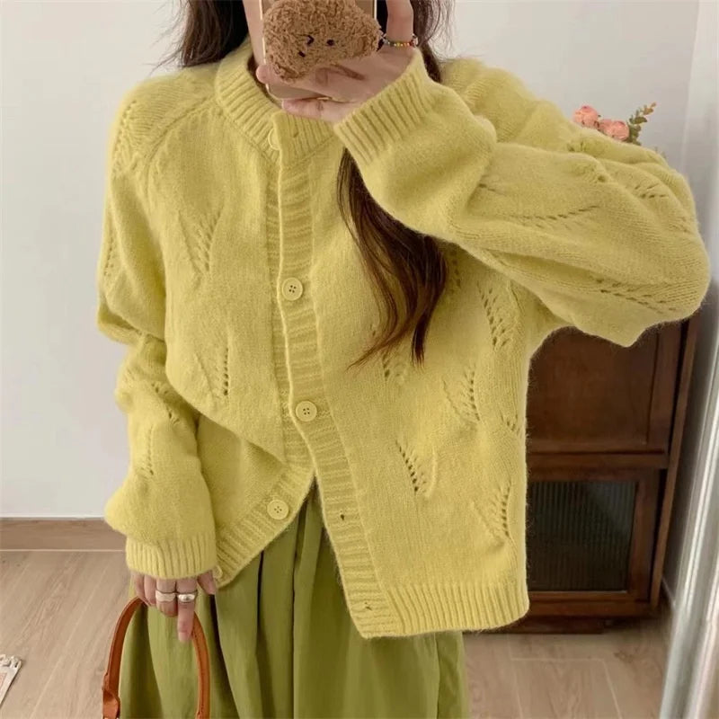 Autumn and Winter New Twisted Knitted Cardigan Loose O Neck Button Sweater Hollow Out Jacquard Design Jacket for Women