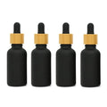 330Pcs Low Customized Premium Matte Black 15ml 20ml 30ml 50ml Cosmetic Essential Oil Bottle with Bamboo Cap Glass Dropper Bottle