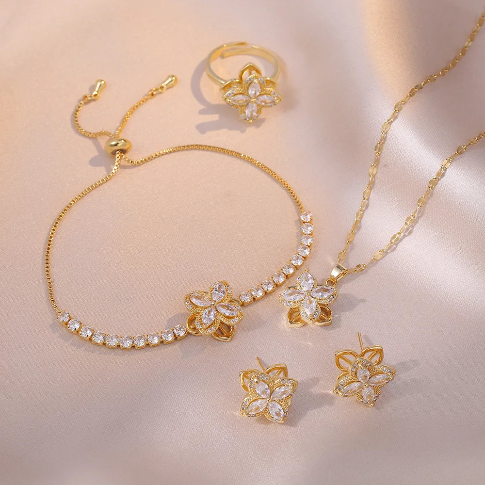 MC205 Wholesale Stainless Steel Chain Rotating Four-Leaf Flower Spinning Necklace Bracelet Pendant Earrings Ring Jewelry Sets