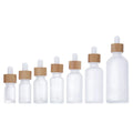 UV-Protected Clear White Frost Glass Essential Oil Dropper Bottle Bamboo Dropper Cap 5ml 100ml Sizes Cylinder Skin Care Cream