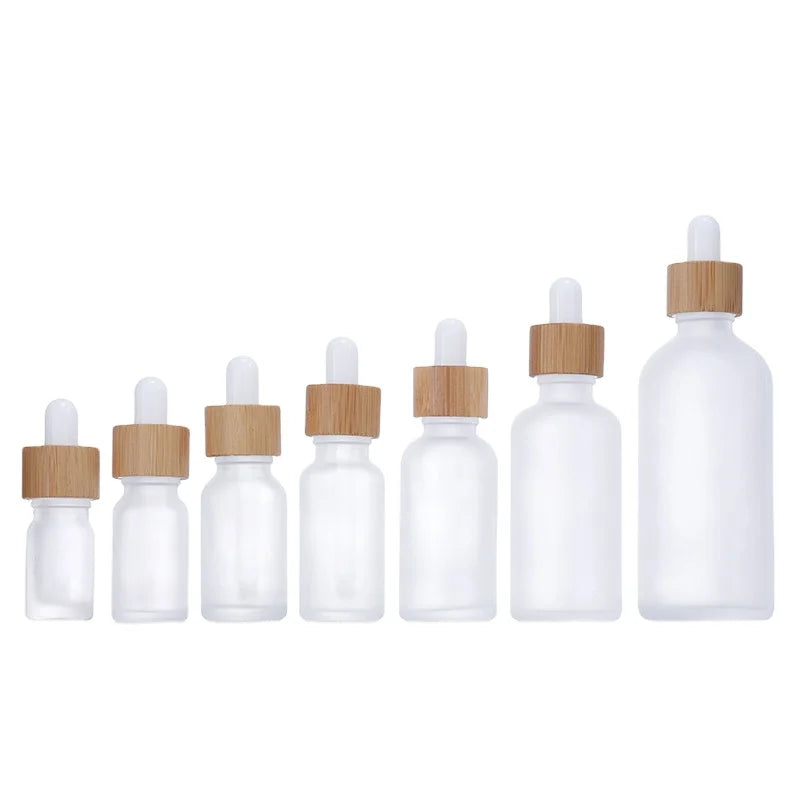 UV-Protected Clear White Frost Glass Essential Oil Dropper Bottle Bamboo Dropper Cap 5ml 100ml Sizes Cylinder Skin Care Cream