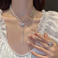 Trendy Two Piece Unique Zircon Tassel Rings Girls Fashion  Bead Ridescent Pearl Jewelry Necklace Set for Women 2025