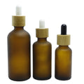 Customized Essential Oil Glass Empty Serum Bottle 30ml Frosted Brown Dropper Bottle with Bamboo Dropper