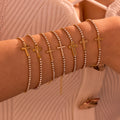 NIMAI Stainless Steel Cross Bracelet with PVD 18K Gold Tennis Chain Fashion Charm Bracelets