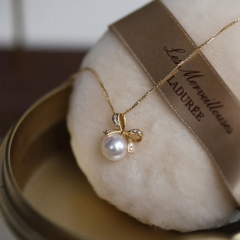Luxury Europe Cute 925 Sterling Silver Bow Tie Knot Freshwater Pearl Pendant Necklace for Women Girls
