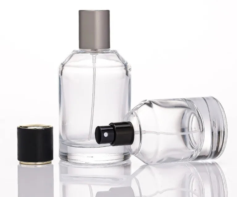 Luxury Recyclable 30ml 50ml 100ml Decorative clear Round Glass Perfume Bottle Custom Refillable Unisex with Pump Cap