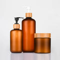 Low MOQ Cosmetic Package Personal Care Hotel Use  60ml 120ml 250ml 500mlplastic PET Cream Lotion Set with Wooden Bamboo Lid Cap