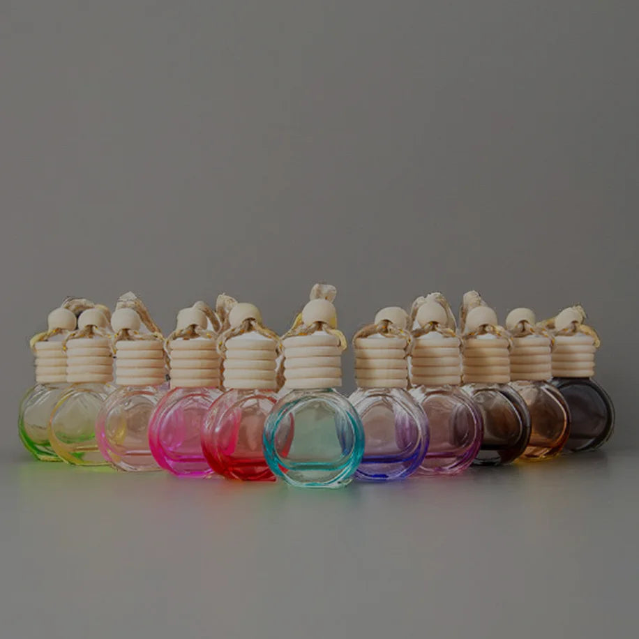 Round Oblate Empty 10ml High Quality Glass Car Pendant Diffuser Perfume Bottle Crown Cap Screen Printed for Indoor Aromatherapy