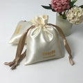 Custom Beige Satin Drawstring Dust Bags with Ribbon Waterproof Simple Logo Printed Gift Cosmetic Bags for Grocery Use