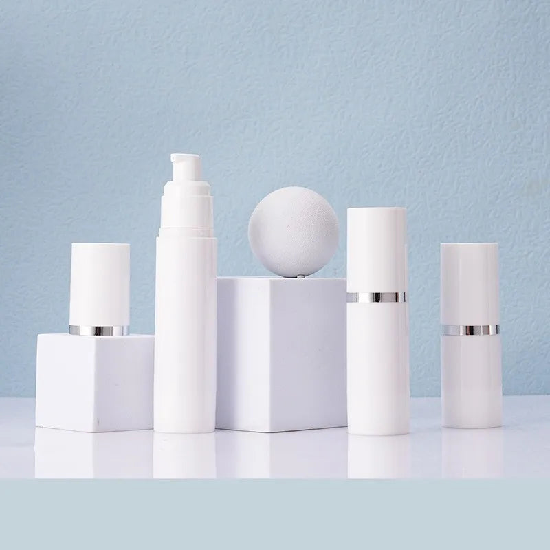 High Quality Custom Logo Empty Cylinder Cream Lotion Spray Bottle with White Caps Airless Plastic for Skin Care Serum & Shampoo