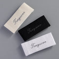Factory Wholesale White and Black Satin Woven Labels Standard Woven End Fold Design