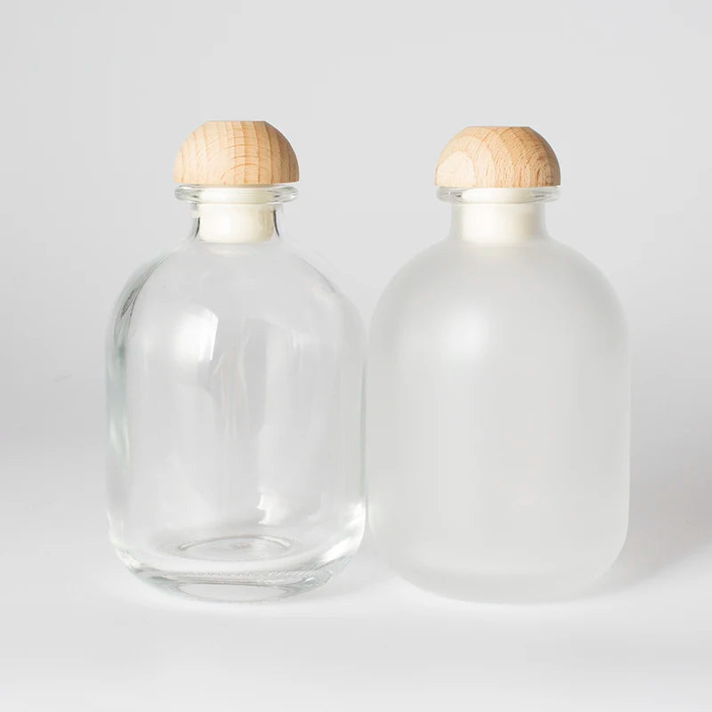 Hot Selling Round Transparent Glass Bottle Beer Whisky Vodka Bottle Custom logo