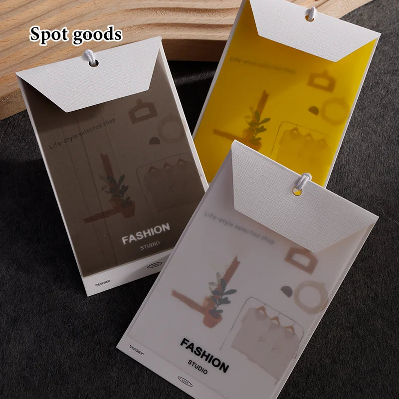 Factory Direct Luxury Printed and Embossed Clothing hang Tags Plastic Pvc Hand Tag Custom Tags for Clothing Brand