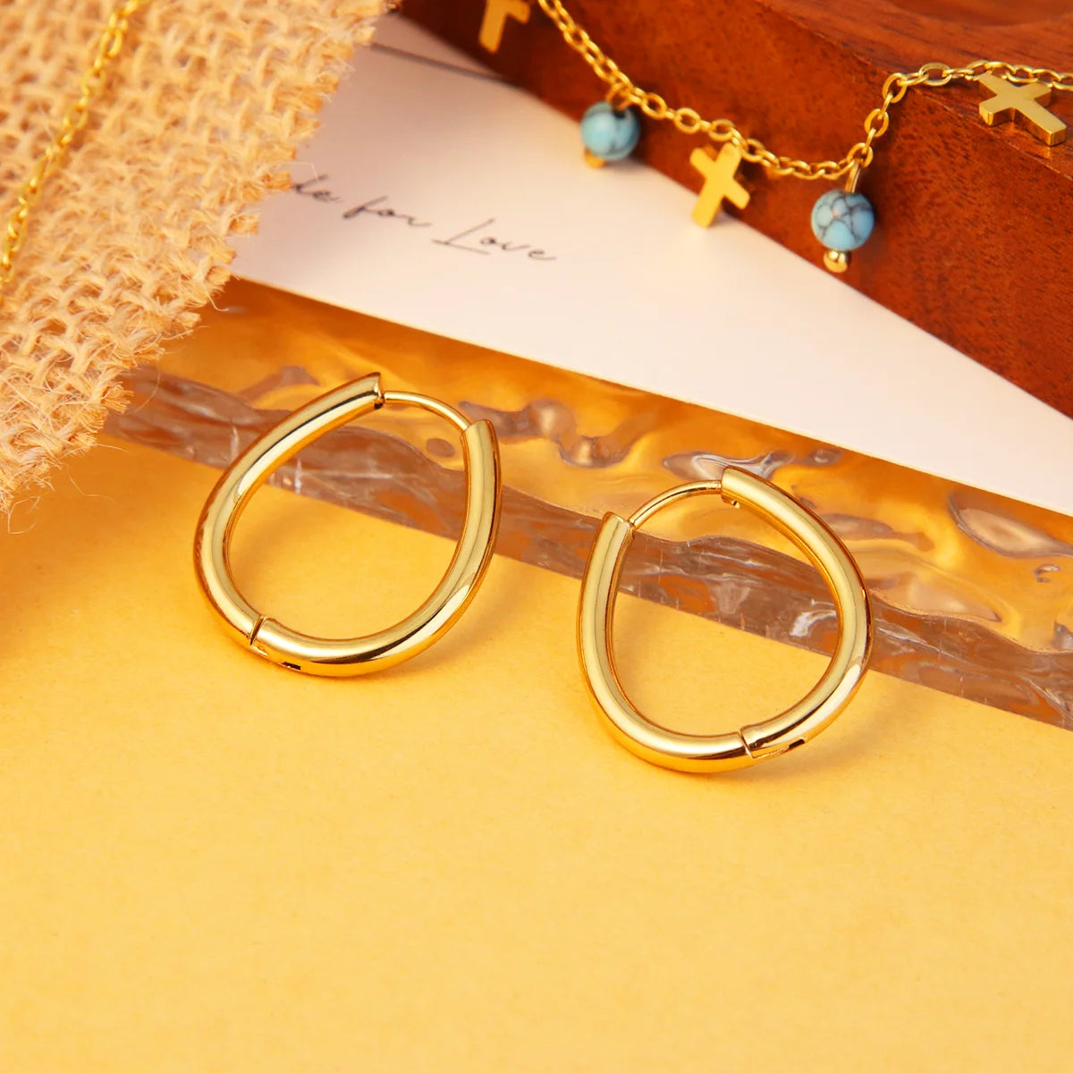 Chris April 316L Stainless Steel PVD Plated Egg Shape Hoops Earrings