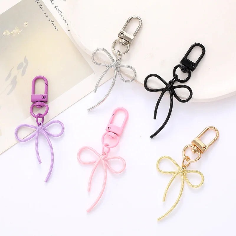 2025 New Metal Keychain Pendant Bag Hanging Decoration Simple and Versatile Hollow Alloy Bow Pendant Accessory