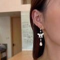 Elegant Freshwater Pearl Earrings White Butterfly Shell New Design Trendy Elegant Fresh Zhuji Rice Potato Pearl Jewelry