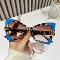 DL Glasses Wholesale Unisex Modern Fashion Sunglasses PC UV400 Protection Personalized Butterfly Cat Eye Gold Purple Gray