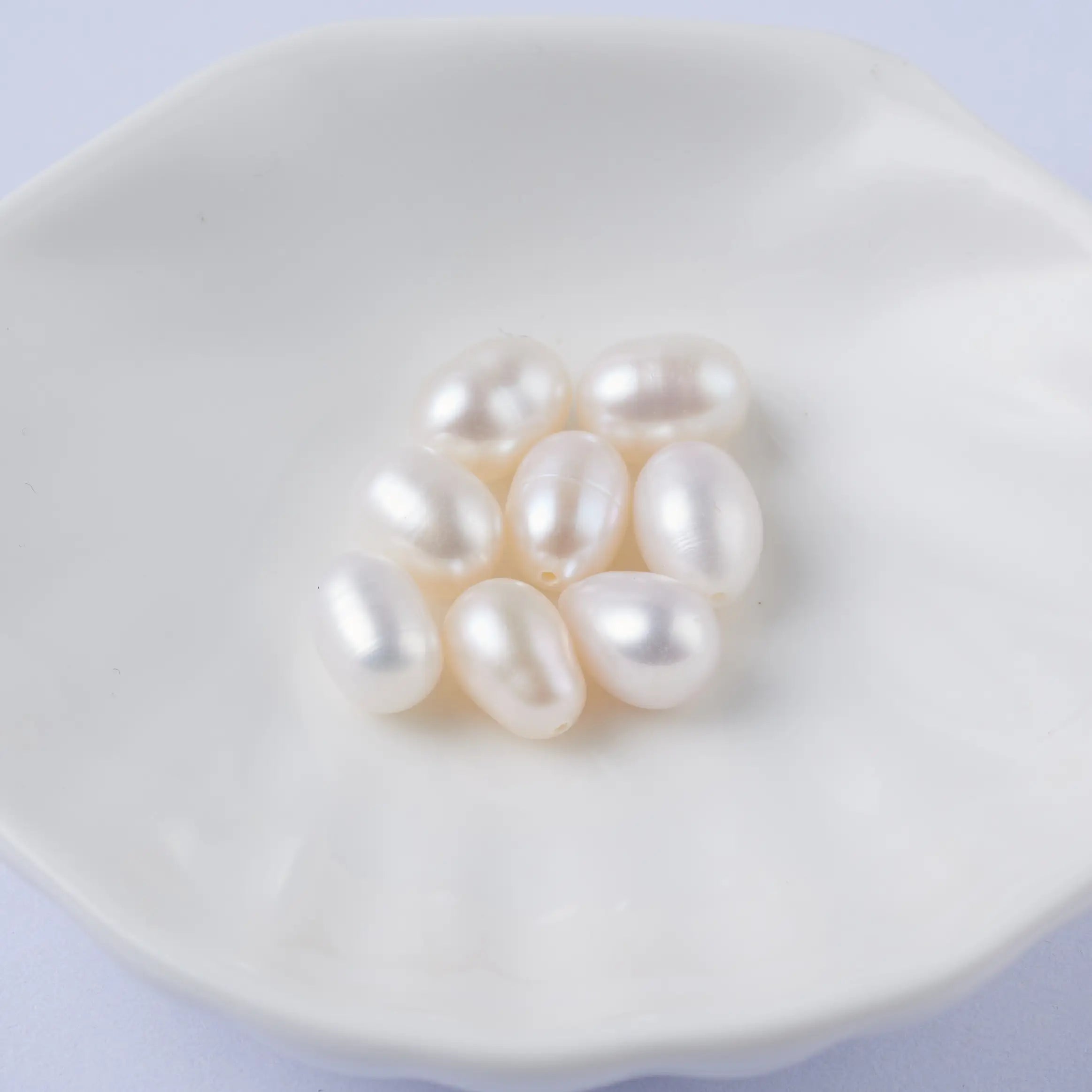 Wholesale 7mm Drop Natural Rice Cultured Freshwater Pearls 3A 4A 5A Grade Loose Beads