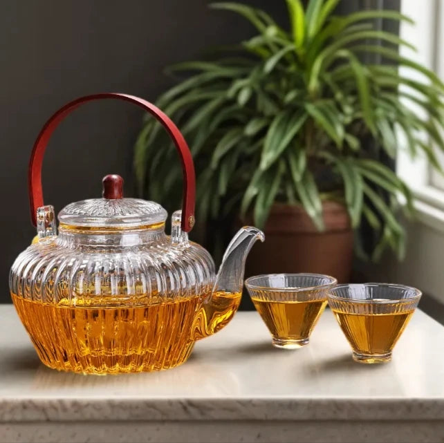 2024 New Style Heat Resistant Glass 900ml Teapot Flower Tea High Borosilicate Glass Teapot With Wood Handle