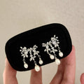 Light Luxury Retro Chinese Branch Leaf Huggie Earrings 4-6mm Natural White Rice AAAA Grade Platinum Plated Freshwater Pearl