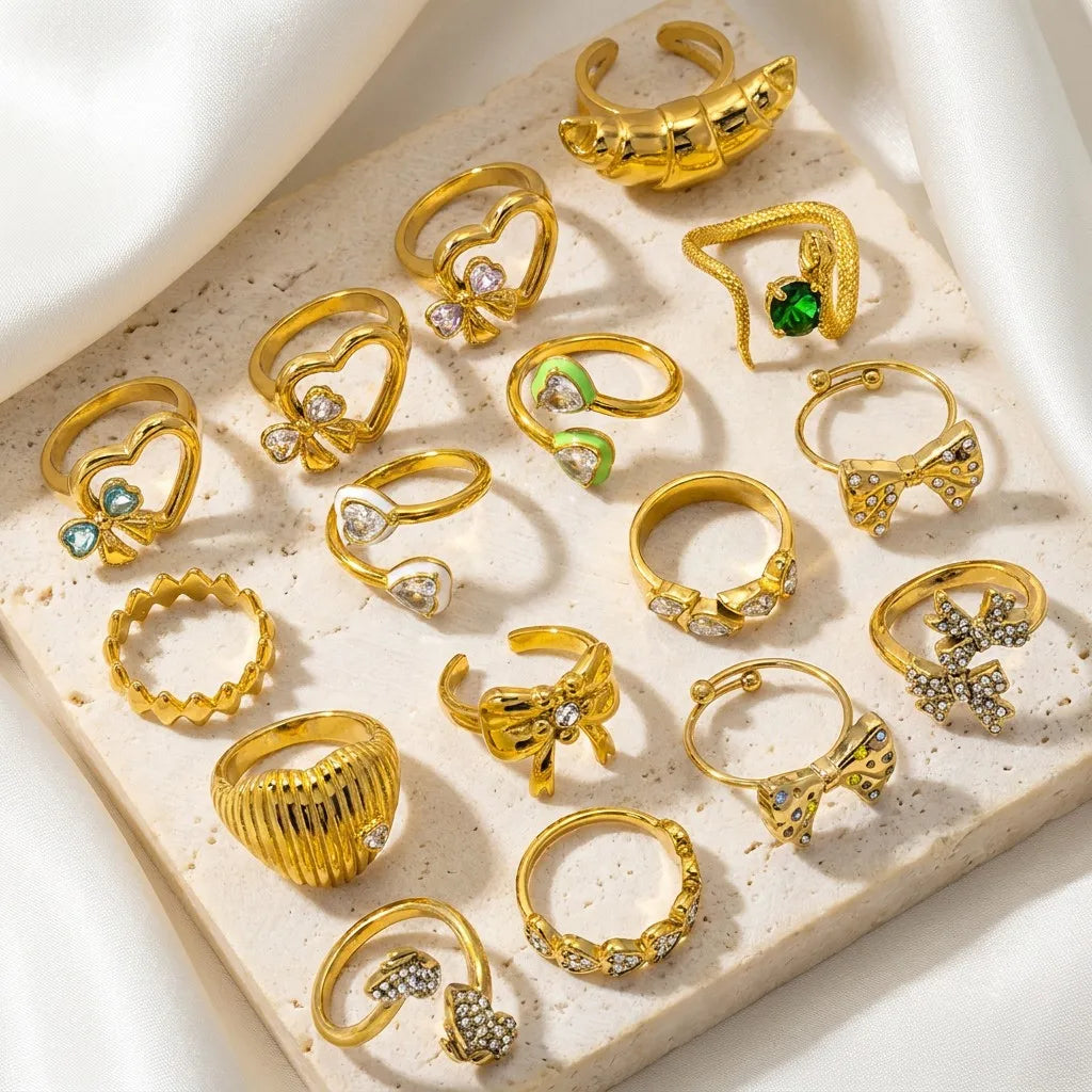 JUSNOVA Waterproof Non-tarnish 18K PVD Gold Plated Stainless Steel Hypoallergenic Statement Bow Heart Snake Croissant Rings