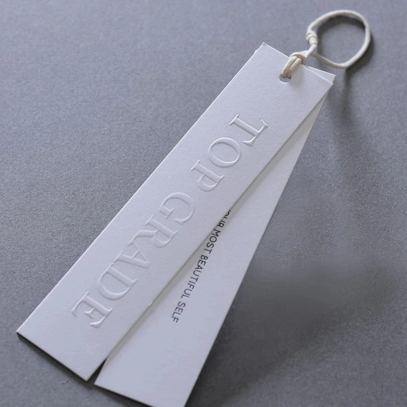 Eco Friendly Embossed Cardboard Paper Hang Tags Custom Logo Clothes Garment Tags for Jeans