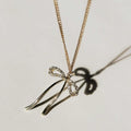 Women's Stainless Steel Gold Silver Plated Bow Necklace Set with Simple Niche Princess Stud Earring Design for Wedding