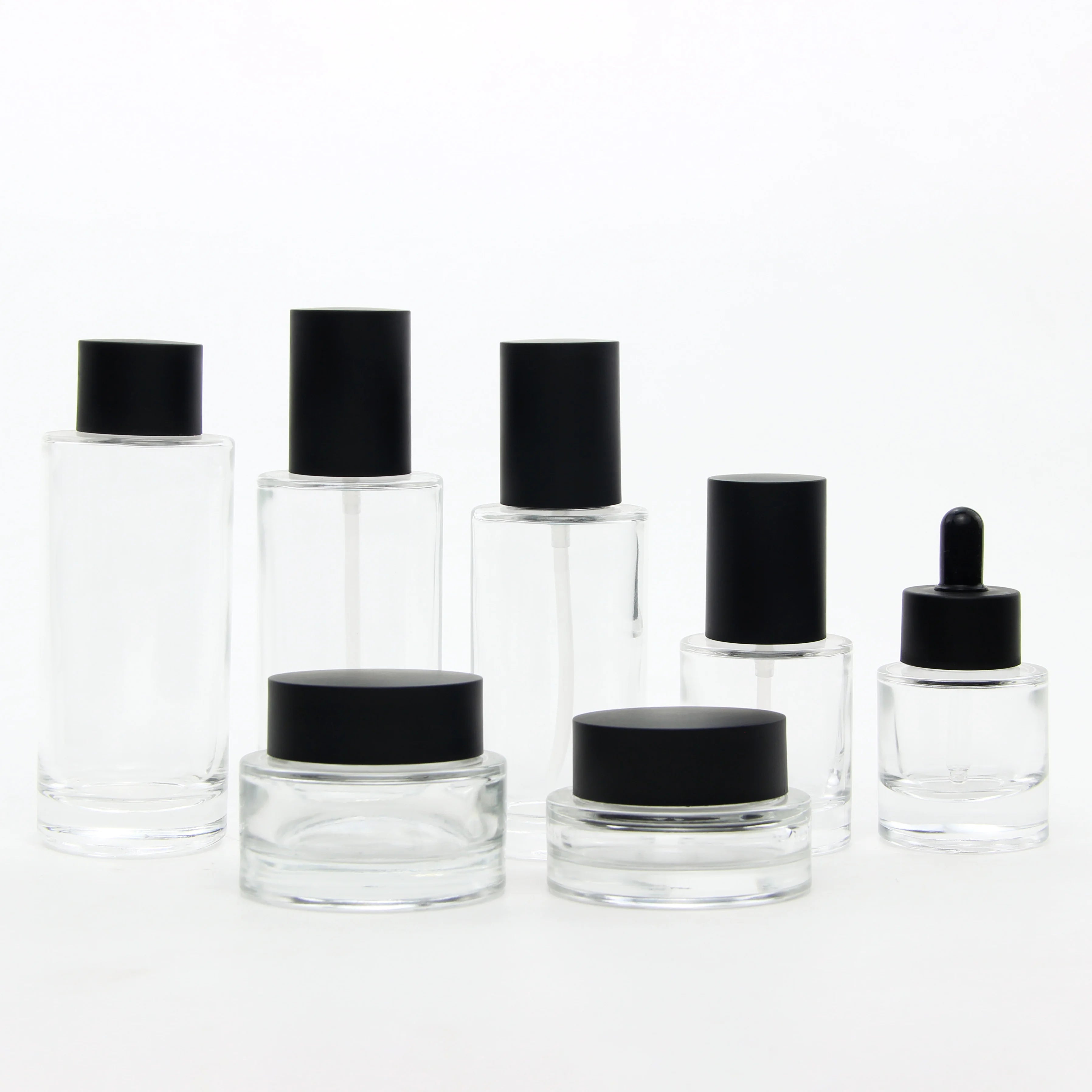 New Design Luxury Thick Bottom clear Cosmetic Serum Lotion Pump Bottle Glass Bottles and Jars Dropper Bottle Skincare Packaging