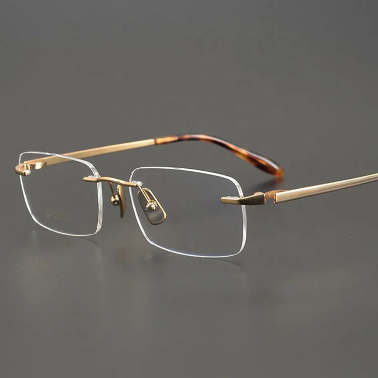 Stylish Blue Light Filter Eyewear for Men Optical Eyeglasses Gold Titanium Frame Taitum Rimless Spectacles Latest Designer Model
